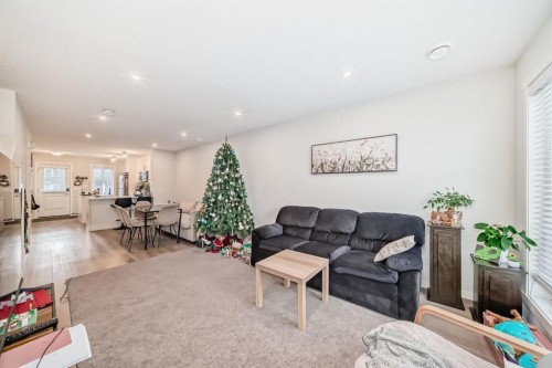 406-474 Seton Circle Se, Calgary, AB - Indoor Photo Showing Living Room
