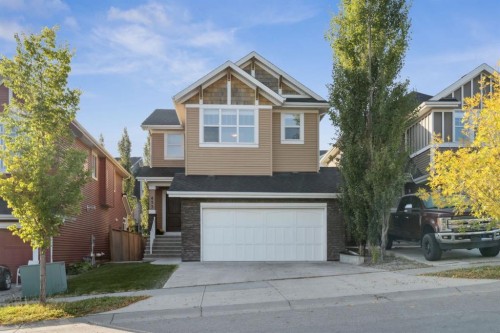 453 River Heights Drive, Cochrane, AB - Outdoor With Facade