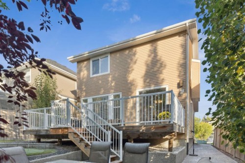 453 River Heights Drive, Cochrane, AB - Outdoor With Deck Patio Veranda