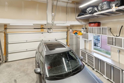 453 River Heights Drive, Cochrane, AB - Indoor Photo Showing Garage