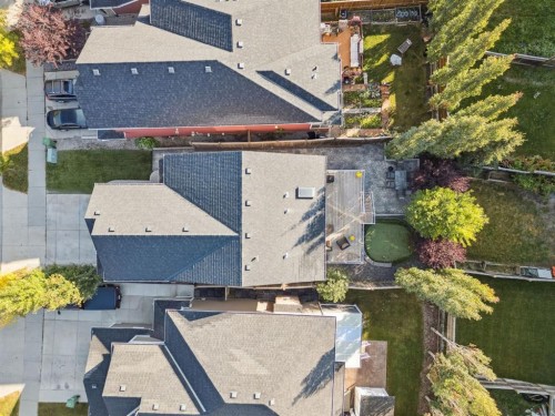 453 River Heights Drive, Cochrane, AB - Outdoor With Deck Patio Veranda