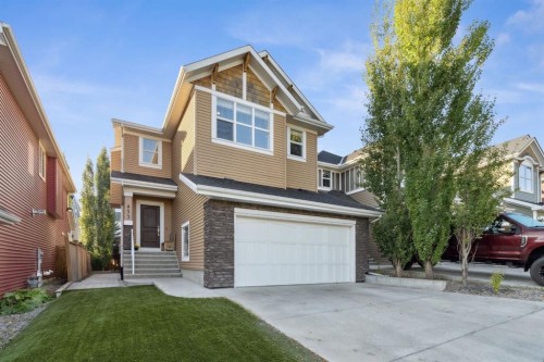 453 River Heights Drive, Cochrane, AB - Outdoor With Facade