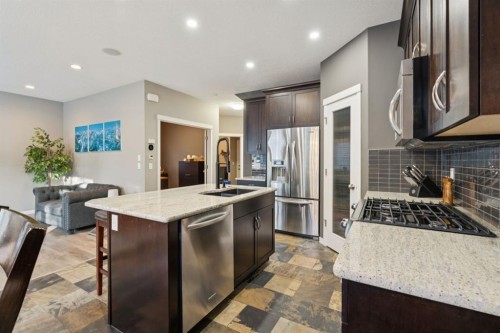453 River Heights Drive, Cochrane, AB - Indoor Photo Showing Kitchen With Upgraded Kitchen