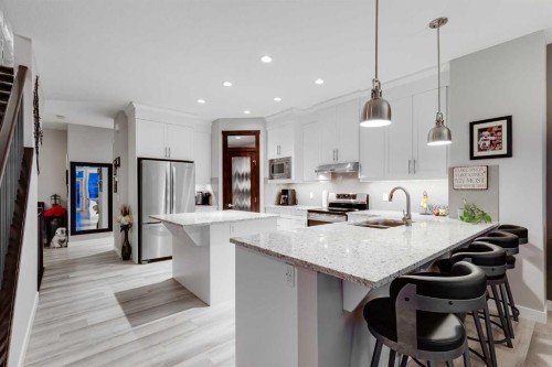 101 Boulder Creek Place, Langdon, AB - Indoor Photo Showing Kitchen With Stainless Steel Kitchen With Upgraded Kitchen