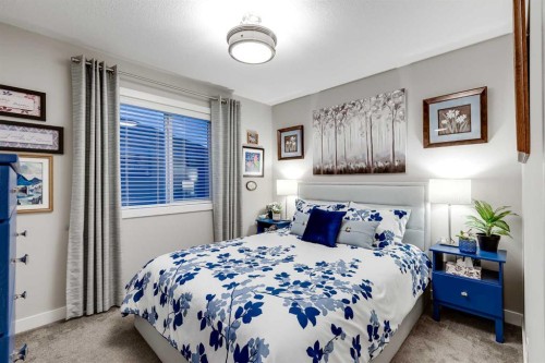 101 Boulder Creek Place, Langdon, AB - Indoor Photo Showing Bedroom