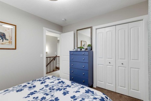 101 Boulder Creek Place, Langdon, AB - Indoor Photo Showing Bedroom