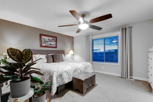 101 Boulder Creek Place, Langdon, AB - Indoor Photo Showing Bedroom