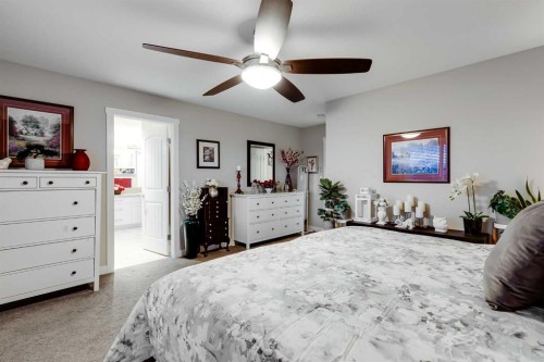 101 Boulder Creek Place, Langdon, AB - Indoor Photo Showing Bedroom