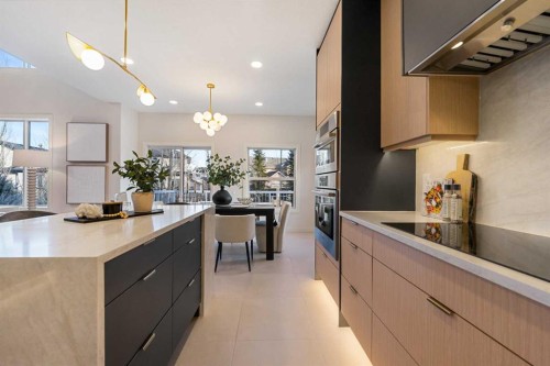 125 Discovery Place Sw, Calgary, AB - Indoor Photo Showing Kitchen With Upgraded Kitchen