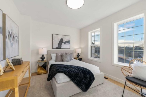 125 Discovery Place Sw, Calgary, AB - Indoor Photo Showing Bedroom