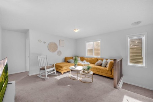 151 Carringham Way Nw, Calgary, AB - Indoor Photo Showing Living Room