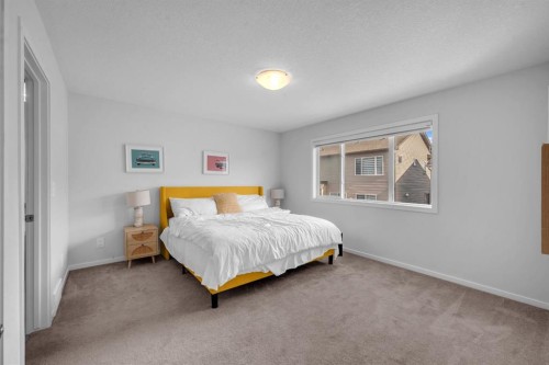 151 Carringham Way Nw, Calgary, AB - Indoor Photo Showing Bedroom
