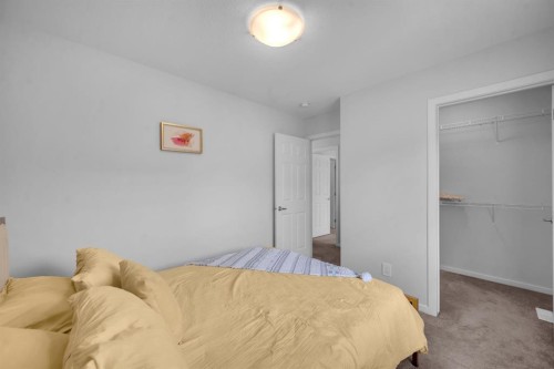 151 Carringham Way Nw, Calgary, AB - Indoor Photo Showing Bedroom