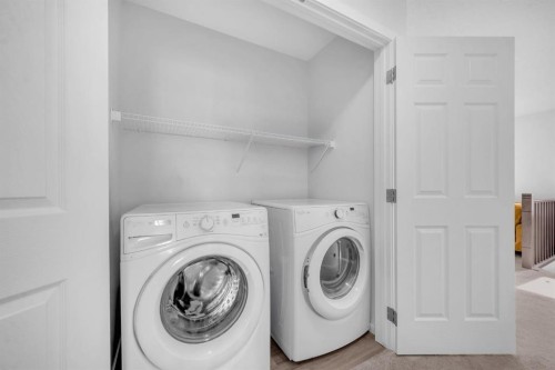 151 Carringham Way Nw, Calgary, AB - Indoor Photo Showing Laundry Room