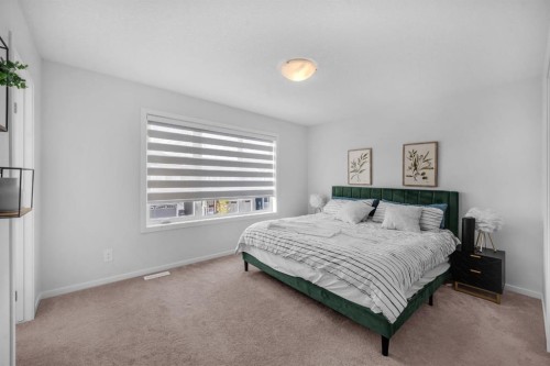 151 Carringham Way Nw, Calgary, AB - Indoor Photo Showing Bedroom