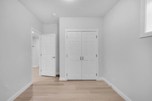 151 Carringham Way Nw, Calgary, AB - Indoor Photo Showing Other Room