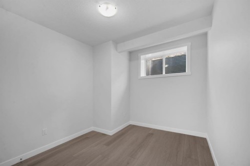151 Carringham Way Nw, Calgary, AB - Indoor Photo Showing Other Room