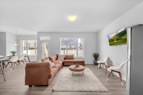 151 Carringham Way Nw, Calgary, AB - Indoor Photo Showing Living Room