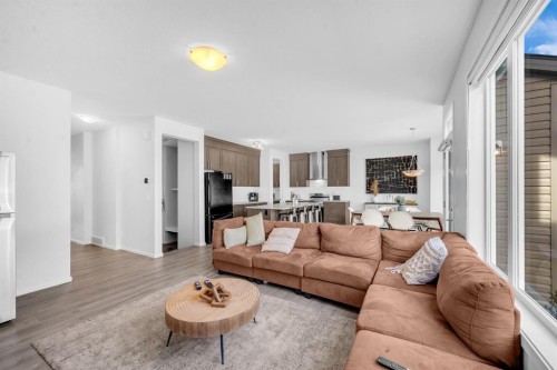 151 Carringham Way Nw, Calgary, AB - Indoor Photo Showing Living Room