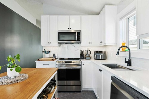103 Hawkmount Green Nw, Calgary, AB - Indoor Photo Showing Kitchen With Stainless Steel Kitchen With Upgraded Kitchen