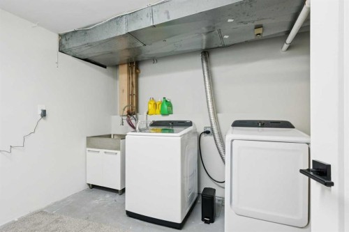 103 Hawkmount Green Nw, Calgary, AB - Indoor Photo Showing Laundry Room