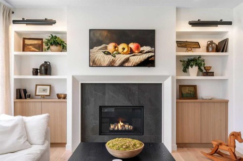 1176 Cranbrook Gardens Se, Calgary, AB - Indoor Photo Showing Living Room With Fireplace