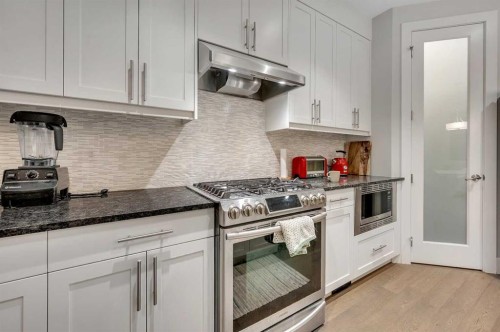 1708 23 Avenue Nw, Calgary, AB - Indoor Photo Showing Kitchen With Stainless Steel Kitchen With Upgraded Kitchen