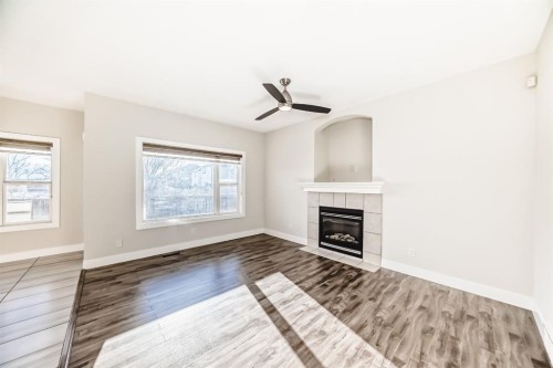 70 Martha'S Meadow Close Ne, Calgary, AB - Indoor Photo Showing Living Room With Fireplace
