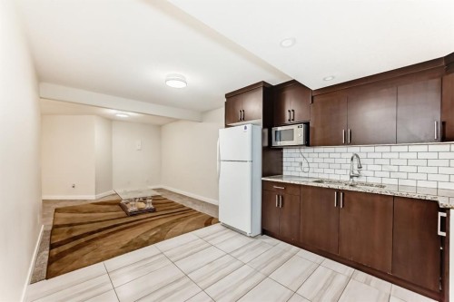 70 Martha'S Meadow Close Ne, Calgary, AB - Indoor Photo Showing Kitchen With Double Sink
