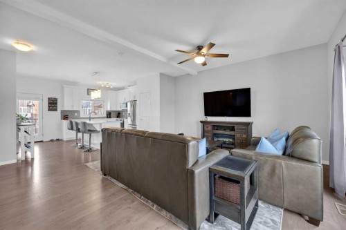 241 Legacy Point Se, Calgary, AB - Indoor Photo Showing Living Room With Fireplace
