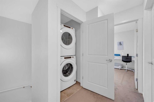 241 Legacy Point Se, Calgary, AB - Indoor Photo Showing Laundry Room