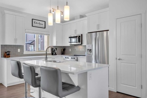241 Legacy Point Se, Calgary, AB - Indoor Photo Showing Kitchen With Stainless Steel Kitchen With Upgraded Kitchen