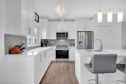 241 Legacy Point Se, Calgary, AB - Indoor Photo Showing Kitchen With Stainless Steel Kitchen With Upgraded Kitchen