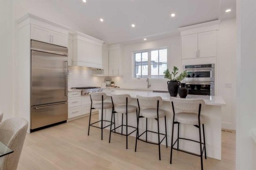 90 Treeline Gardens Sw, Calgary, AB - Indoor Photo Showing Kitchen With Upgraded Kitchen