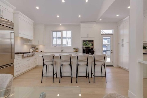 90 Treeline Gardens Sw, Calgary, AB - Indoor Photo Showing Kitchen With Upgraded Kitchen
