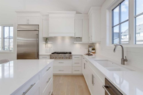 90 Treeline Gardens Sw, Calgary, AB - Indoor Photo Showing Kitchen With Upgraded Kitchen
