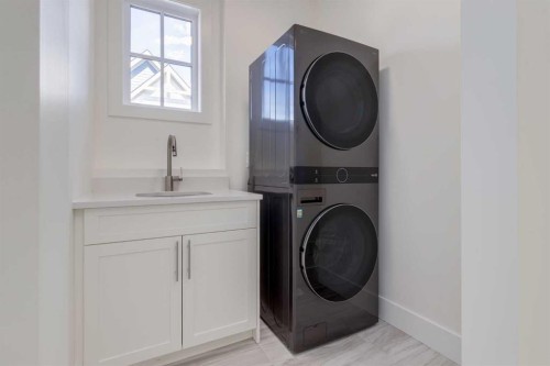 90 Treeline Gardens Sw, Calgary, AB - Indoor Photo Showing Laundry Room