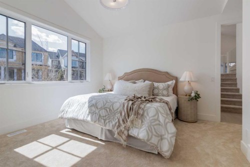90 Treeline Gardens Sw, Calgary, AB - Indoor Photo Showing Bedroom