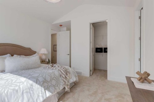 90 Treeline Gardens Sw, Calgary, AB - Indoor Photo Showing Bedroom