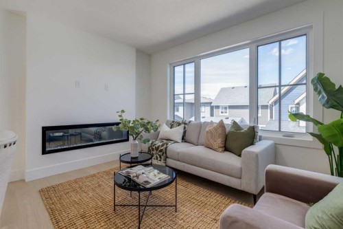 90 Treeline Gardens Sw, Calgary, AB - Indoor Photo Showing Living Room With Fireplace