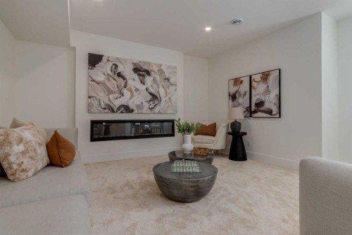90 Treeline Gardens Sw, Calgary, AB - Indoor Photo Showing Living Room With Fireplace