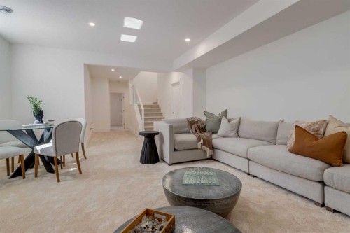 90 Treeline Gardens Sw, Calgary, AB - Indoor Photo Showing Living Room