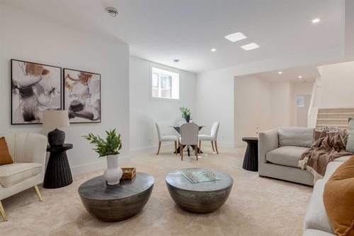 90 Treeline Gardens Sw, Calgary, AB - Indoor Photo Showing Living Room