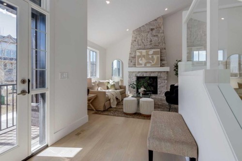 90 Treeline Gardens Sw, Calgary, AB - Indoor With Fireplace