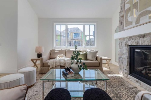90 Treeline Gardens Sw, Calgary, AB - Indoor Photo Showing Living Room With Fireplace