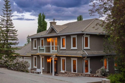 57 Slopes Point Sw, Calgary, AB - Outdoor With Facade