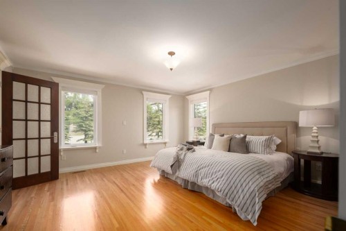 57 Slopes Point Sw, Calgary, AB - Indoor Photo Showing Bedroom