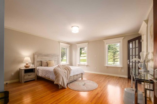 57 Slopes Point Sw, Calgary, AB - Indoor Photo Showing Bedroom