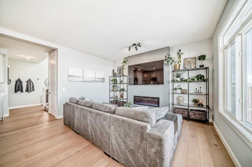 852 Marina Drive, Chestermere, AB - Indoor Photo Showing Living Room With Fireplace