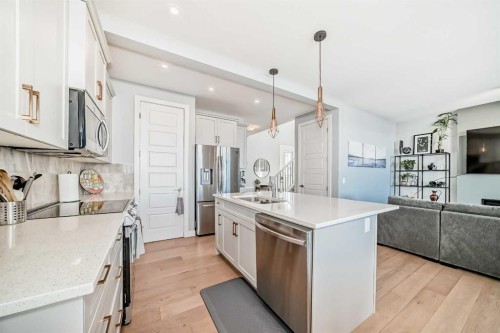 852 Marina Drive, Chestermere, AB - Indoor Photo Showing Kitchen With Double Sink With Upgraded Kitchen